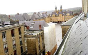 an aerial view of a city with buildings at Appartement lumineux et calme avec vue sur la Place Ducale - Hyper centre in Charleville-Mézières