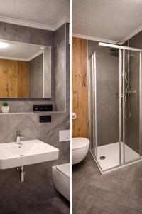a bathroom with a shower and a sink and a toilet at Stadtappartement Saalfelden in Saalfelden am Steinernen Meer