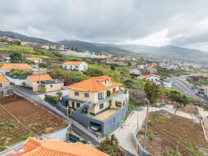 an aerial view of a city with houses at Casa do Avô Ladeira in Estreito da Calheta