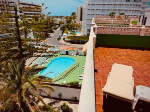 a view of the pool from the roof of a building at Valparaíso Apartments Flamingo in San Bartolomé