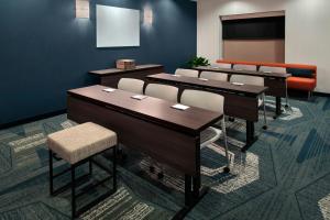 a classroom with desks and chairs in a room at SpringHill Suites by Marriott Albany Latham-Colonie in Albany +15 photos