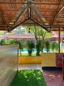 a pavilion with a skateboard ramp in a park at Ponyo Stays in Cochin +11 photos