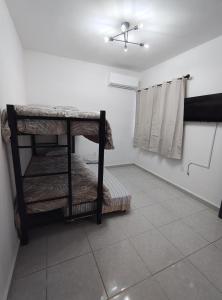 a room with a room with a room with a room at Departamento a 3 min de Playa Miramar in Ciudad Madero