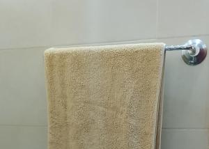 a towel is hanging on a shower curtain at Avocado Lodge in Lushoto +92 photos