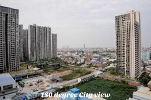 an aerial view of a city with tall buildings at Minimalist Living , One bedroom in Phnom Penh