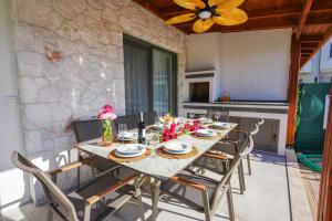 a dining room with a table and chairs at Villa Karya in Dalyan
