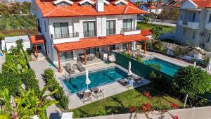 an aerial view of a house with a swimming pool at Villa Karya in Dalyan