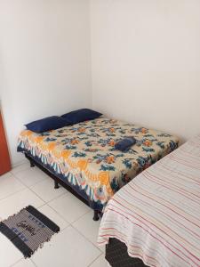a bedroom with two beds in a room at Casa mobiliada 2 Com 4 camas e 2 quartos com ar condicionado in Juazeiro do Norte