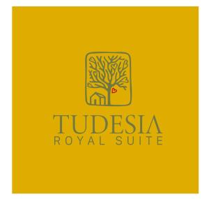 a yellow logo with a tree in the middle at Tudesia royal suite in Todi
