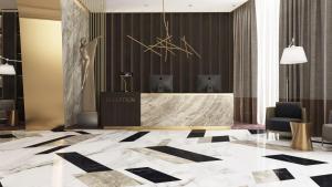 a lobby of a hotel with a reception desk at Three Corners Hotel in Skopje