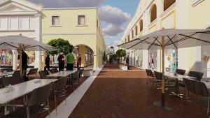 a rendering of a restaurant with tables and umbrellas at Three Corners Hotel in Skopje