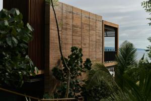 a brick building with a window on the side of it at Siari Riviera Nayarit, a Ritz-Carlton Reserve in El Divisadero