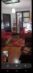 a living room with a couch and a table at Alojamento centro do Porto -Almada in Porto