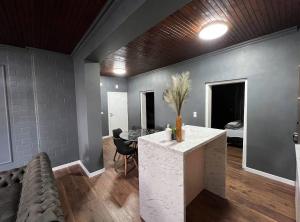 a living room with a table and a couch at Villa Luxury Crystal center in Bihać