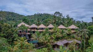 an aerial view of a resort in the jungle at Sweet Escape - Boutique Hotel in Sidemen