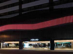 a building with the word rave on the side of it at Hotel Reve Taichung in Daya