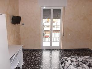 TV a/nebo společenská místnost v ubytování Bed And Breakfast Il Subacqueo