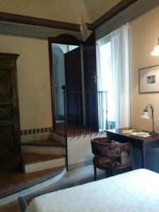 Posteľ alebo postele v izbe v ubytovaní Villa Palagione Centro Interculturale