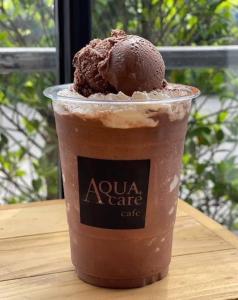 a drink with a scoop of ice cream and a chocolate shake at มาทาเลรีสอร์ท in Ang Thong +11 photos