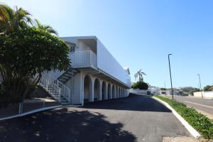 a building on the side of a road at Don Pancho Beach Resort in Bargara