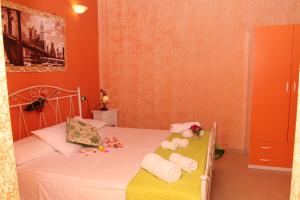 Ein Bett oder Betten in einem Zimmer der Unterkunft Tenuta Paifer