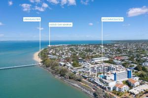an aerial view of the shoreline of a beach at Oceanview Oasis in Urangan
