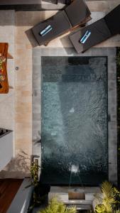 an overhead view of a swimming pool in a house at Villa Mesari Bona in Blahbatu