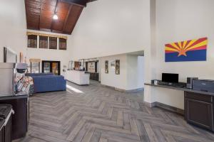 a large room with wooden floors and a lobby at Quality Inn & Suites Goodyear - Phoenix West in Goodyear