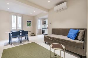 a living room with a couch and a table at Palazzo Accademia in Florence