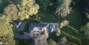 an aerial view of a house in the forest at Au Clos Caleste in Wellin