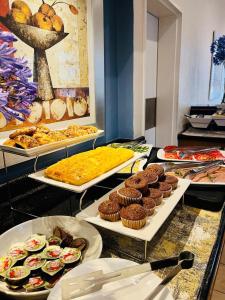 a buffet with many different types of food on display at Road Lodge Isando in Germiston