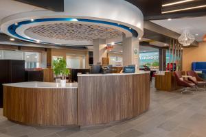 a lobby with a reception counter in a hospital at Tru By Hilton Gananoque, On in Gananoque +30 photos