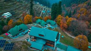 an aerial view of a house with solar panels at Semari Resort in Muzaffarabad