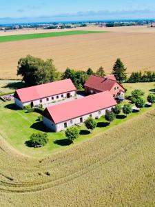 an aerial view of a barn in a field at Österlen, Solhögs Gård nr 2 in Hammenhög