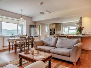 a living room with a couch and a table at 2 Bed in Llangammarch Wells oc-bn059 in Garth +30 photos