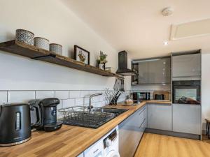 a kitchen with a sink and a counter at 2 Bed in Newark oc-87683 in Coddington