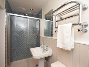 a bathroom with a sink and a shower at 8 Bed in Rugeley oc-79321 in Abbots Bromley +27 photos