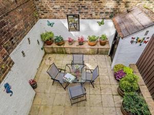 an overhead view of a patio with a table and chairs at 2 Bed in Ashbourne oc-85571 in Ashbourne