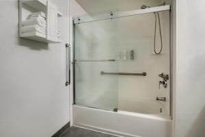 a shower with a glass door in a bathroom at Hampton Inn Beaufort in Beaufort +43 photos