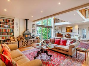 a living room with a couch and a table at 2 Bed in Kington oc-92986 in Lyonshall