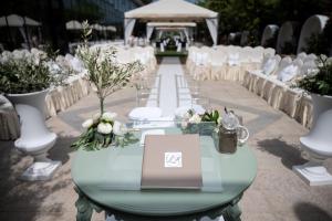 a table set up for a wedding with white chairs at Grand Hotel Europa in Isernia +64 photos