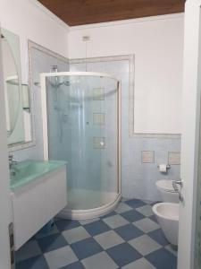 a bathroom with a shower and a sink and a toilet at B&B Ca' Vecchia in Budrio +29 photos