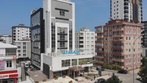 an aerial view of a city with tall buildings at mutlu genç dur in Atakum