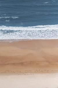 a painting of a beach with the ocean at Hotel Ponta do Madeiro in Pipa