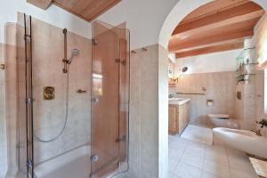 a bathroom with a shower and a sink at Haus Bella in Schwangau