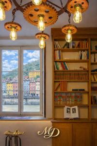 a room with a book shelf and a window at MYD - The Jules Verne in Grenoble
