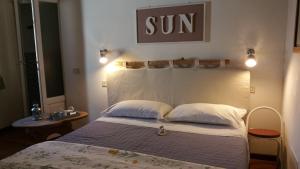 Postel nebo postele na pokoji v ubytování Dragonfly B&B