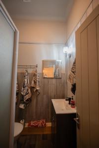 a bathroom with a sink and a mirror at The Pheasant in Broseley