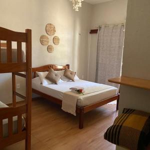 a bedroom with a bed and a bunk bed at Rekanto Sabiá in Jijoca de Jericoacoara +13 photos