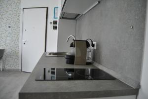 A cozinha ou cozinha compacta de A Zonzo